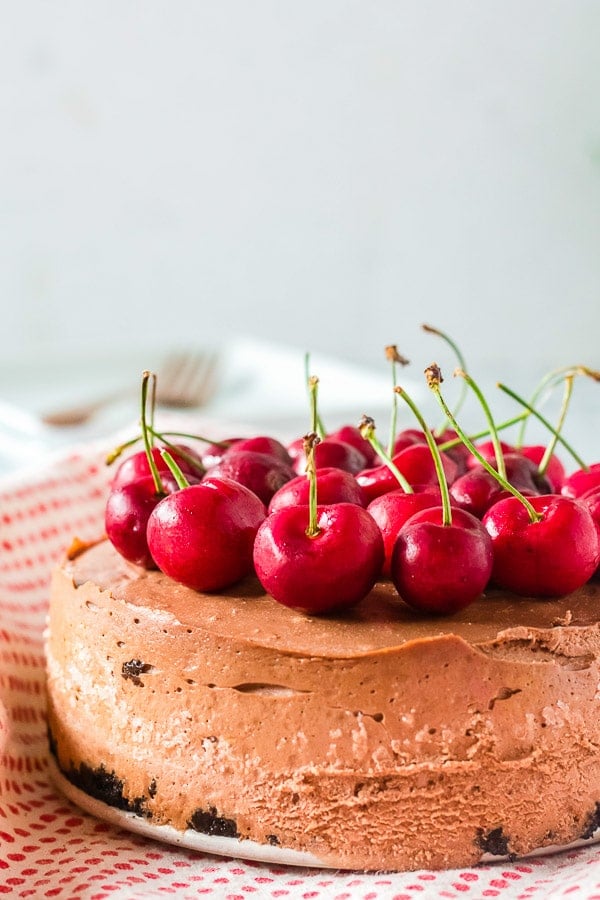 Chocolate Cherry Instant Pot Cheesecake with cherries side view