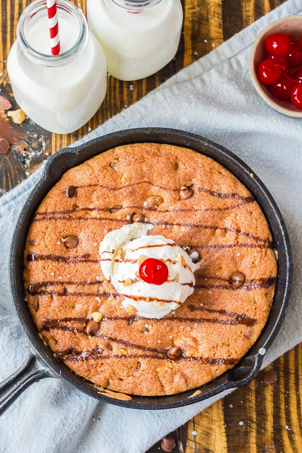 pizookie cookie with ice cream and chocolate sauce