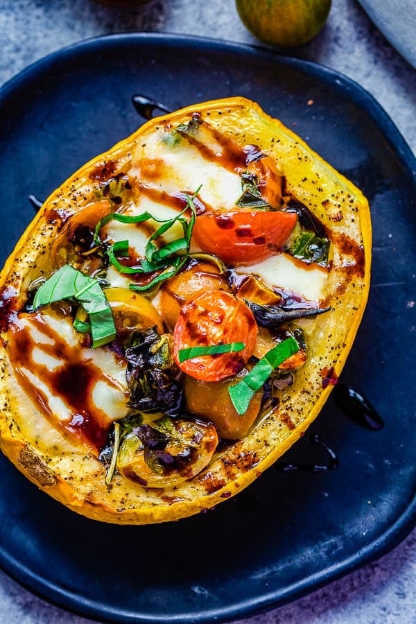 baked spaghetti squash with tomato and cheese filling