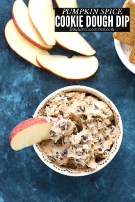 pumpkin spice cookie dough dip in a bowl with apples.