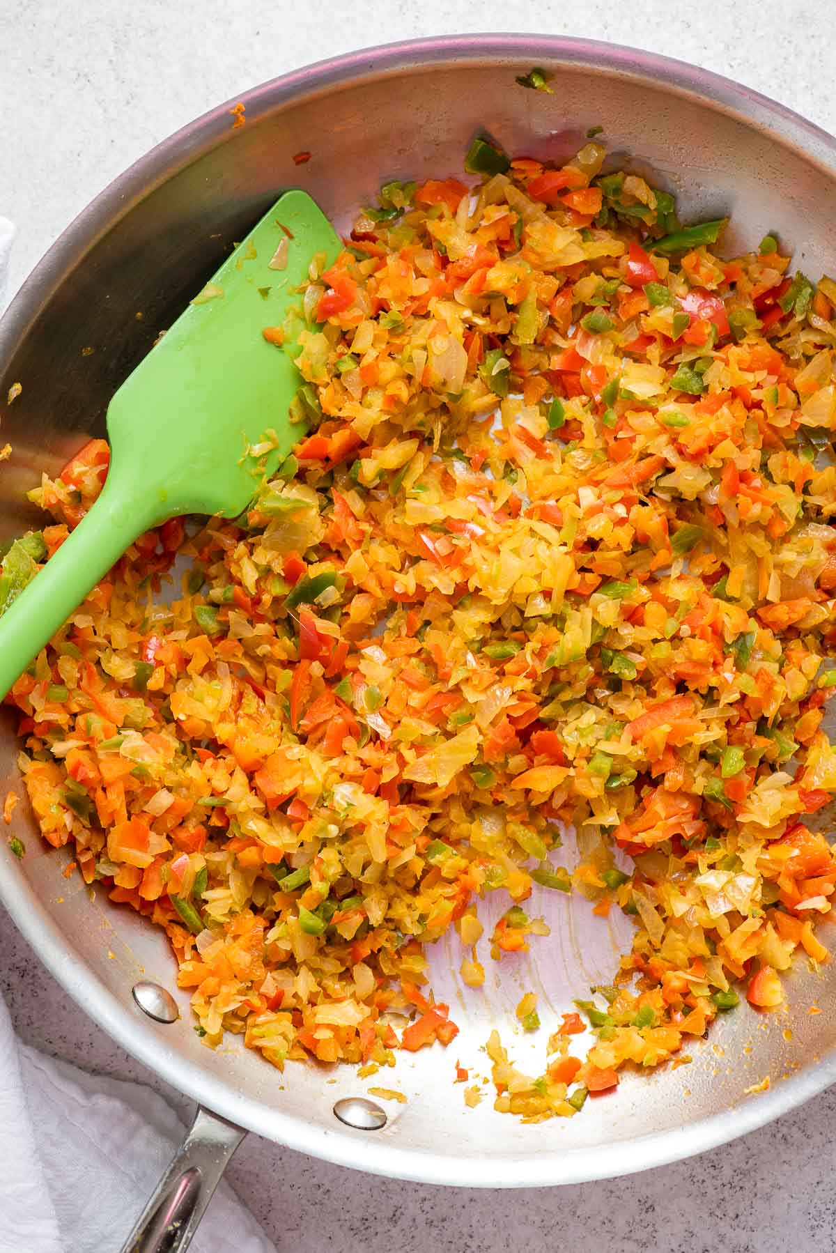 sautéing vegetables for shakhuka sauce