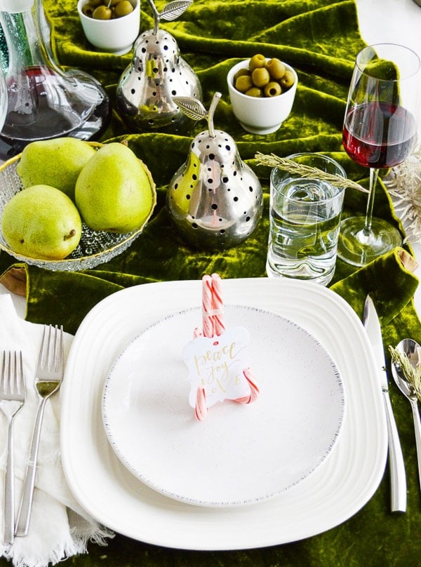 holiday table with homemade place card settings made with candy canes