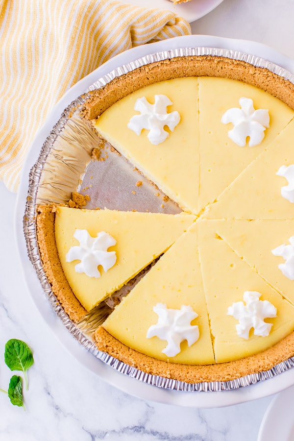 lemon pie whole pie sliced 