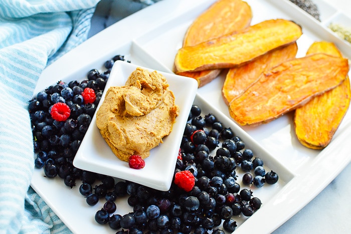 sliced sweet potatoes with nut butter and fruit