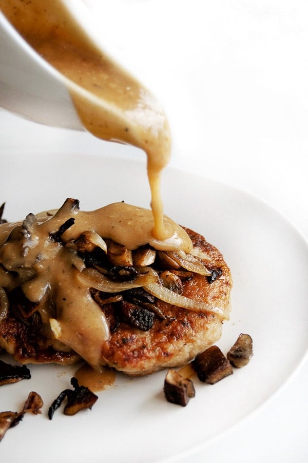 Salisbury Steak with gravy pouring 