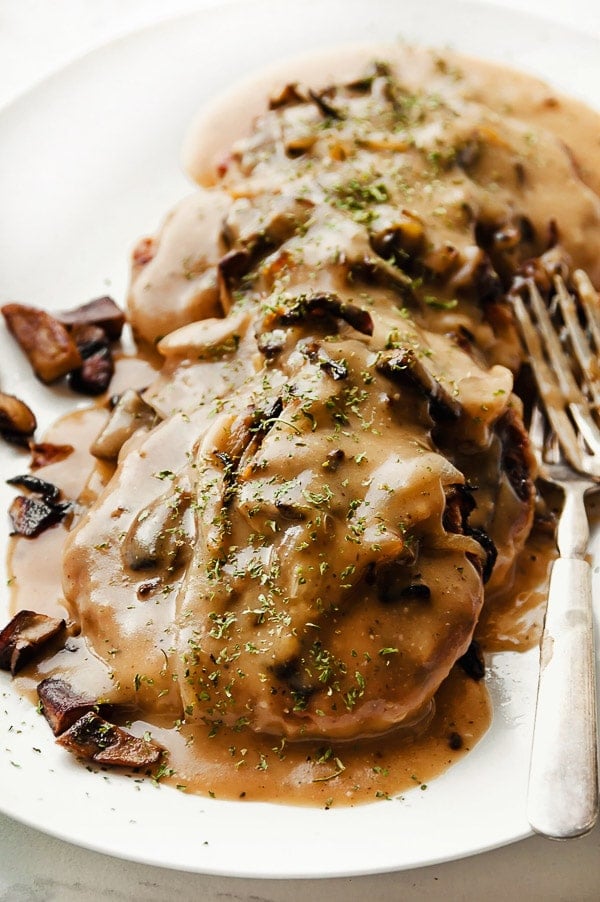 Chicken Salisbury Steak with gravyand fork 