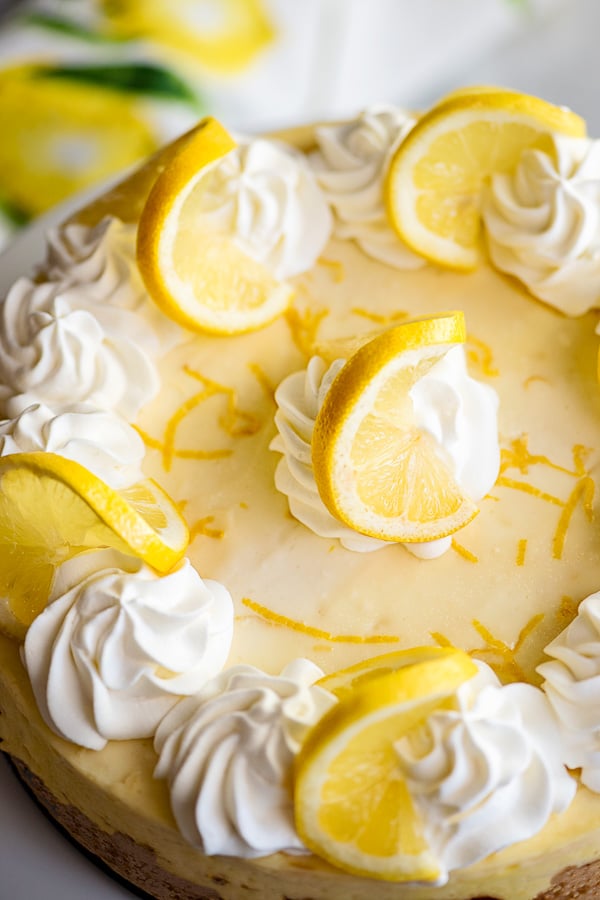 decorated lemon cheesecake from above close up 