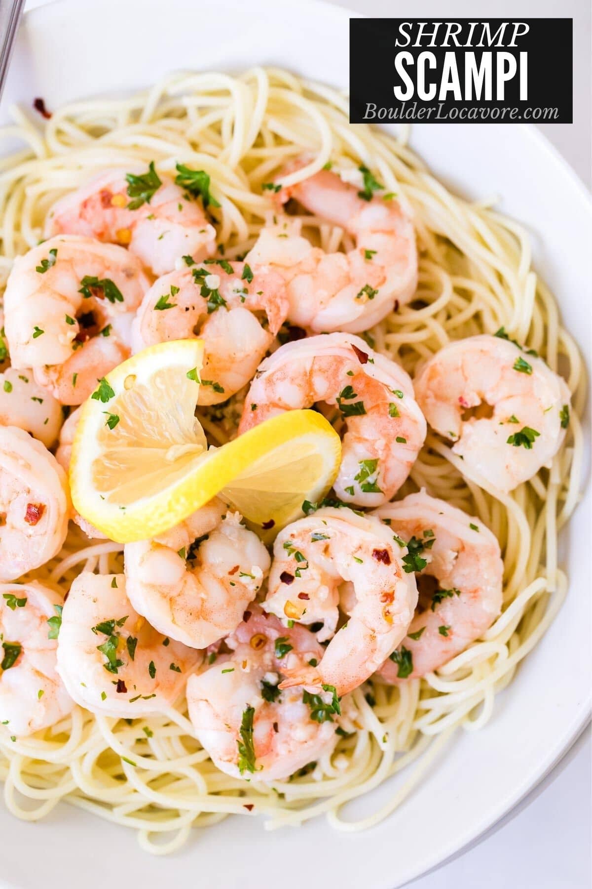 shrimp scampi on a bowl of pasta title