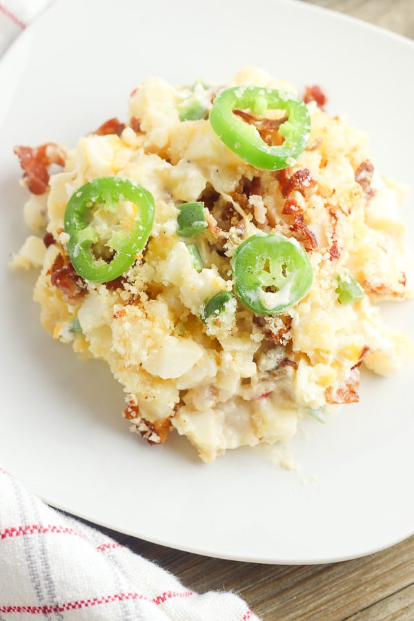 Jalapeno Popper Cheesy Potato recipe serving on a white plate