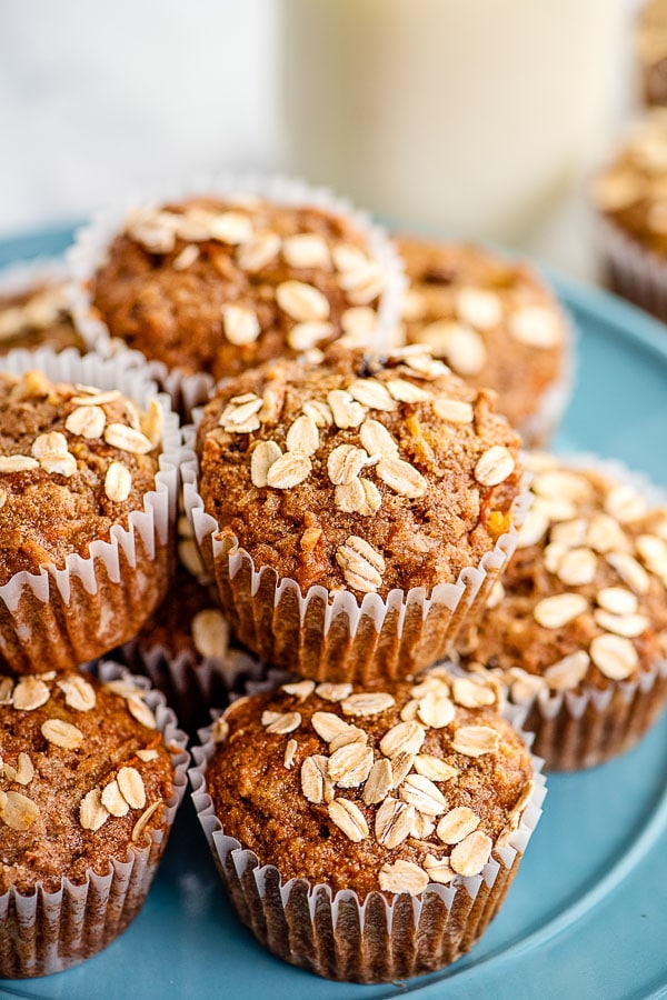 morning glory muffins stacked on blue plate 