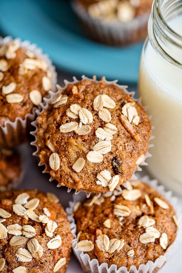 morning glory muffins stacked on blue plate close up