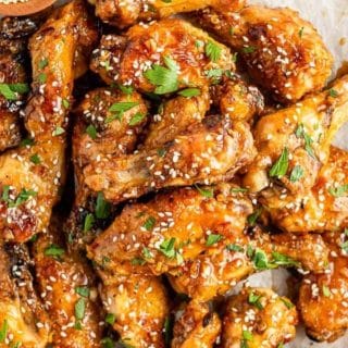 close up of Sticky Grilled Chicken Wings with recipe title on image