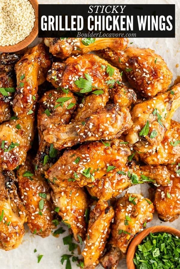 close up of Sticky Grilled Chicken Wings with recipe title on image