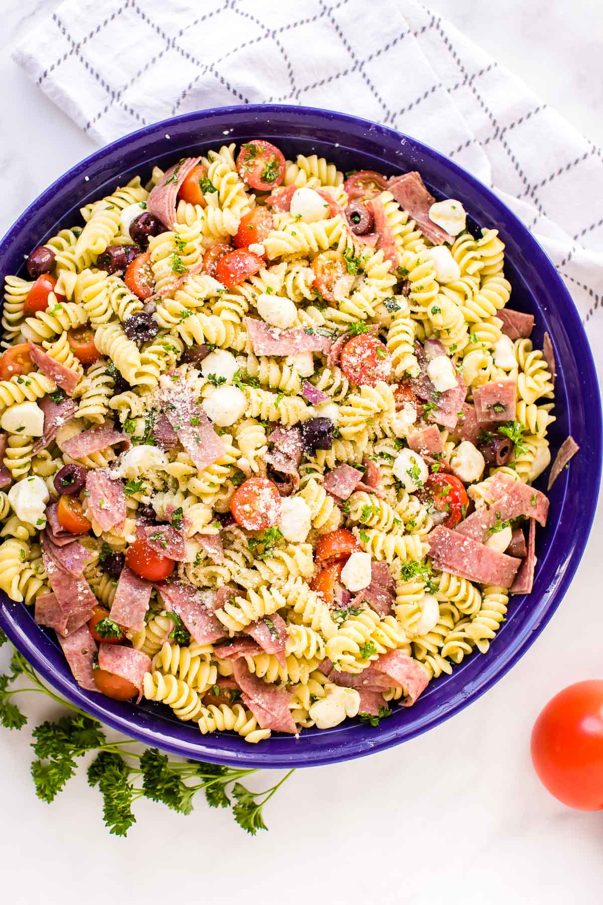 Italian Pasta Salad in a blue serving bowl 