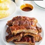 Oven Baked Ribs on a white plate (title image)