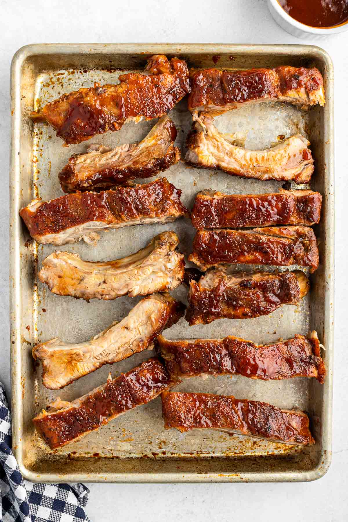 baking sheet of baby back ribs