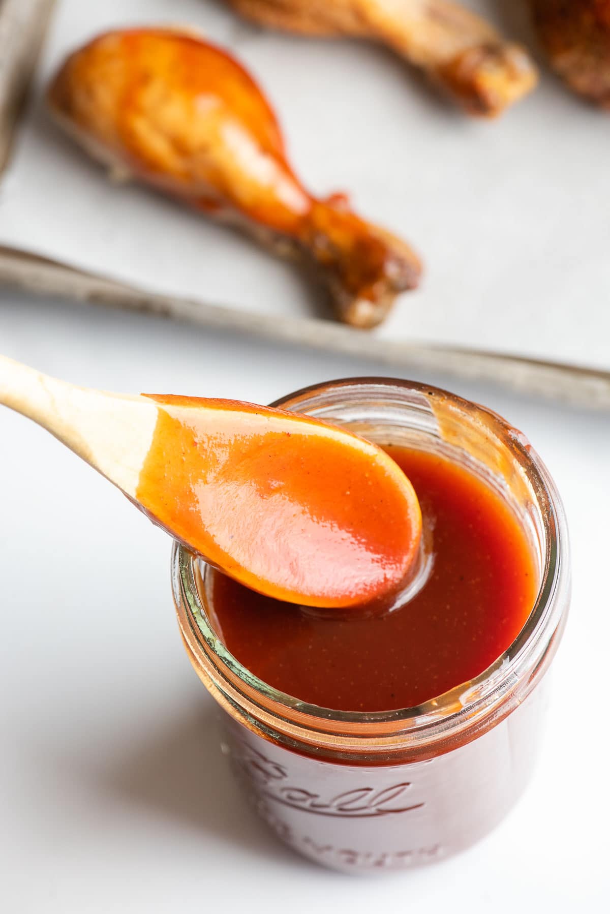 homemade barbecue sauce with spoon