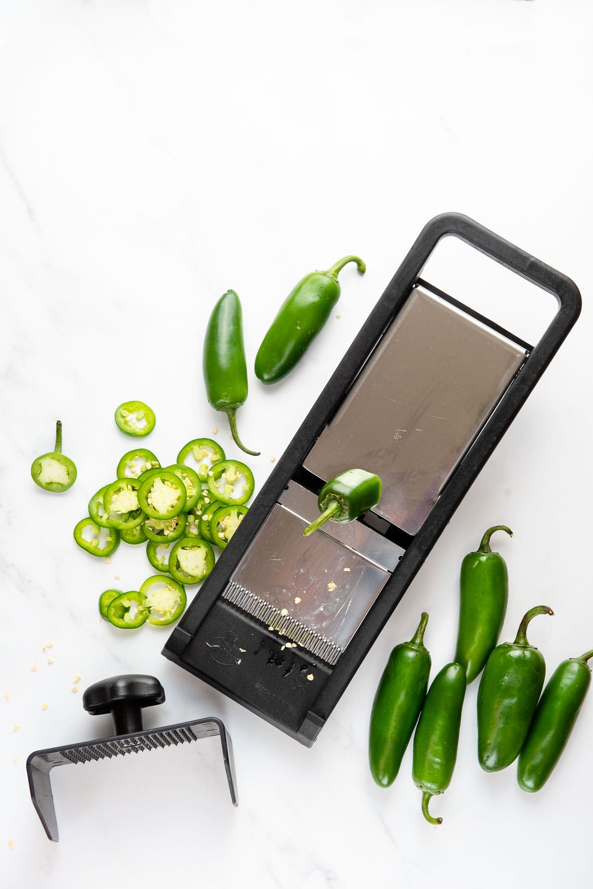 slicing jalapenos with a mandoline 