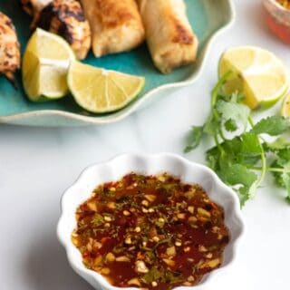 Thai Dipping Sauce in a white ruffle edges bowl title image