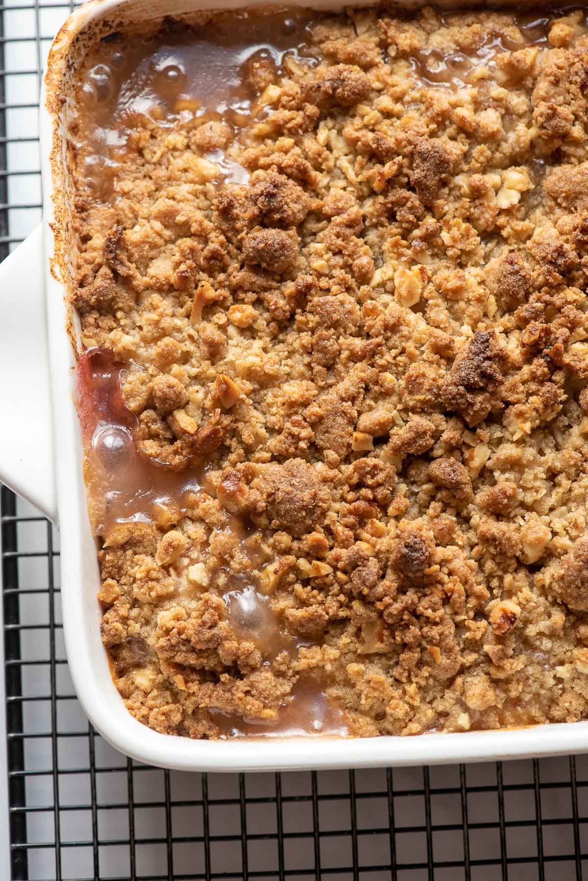 cooked peach crumble on cooling rack