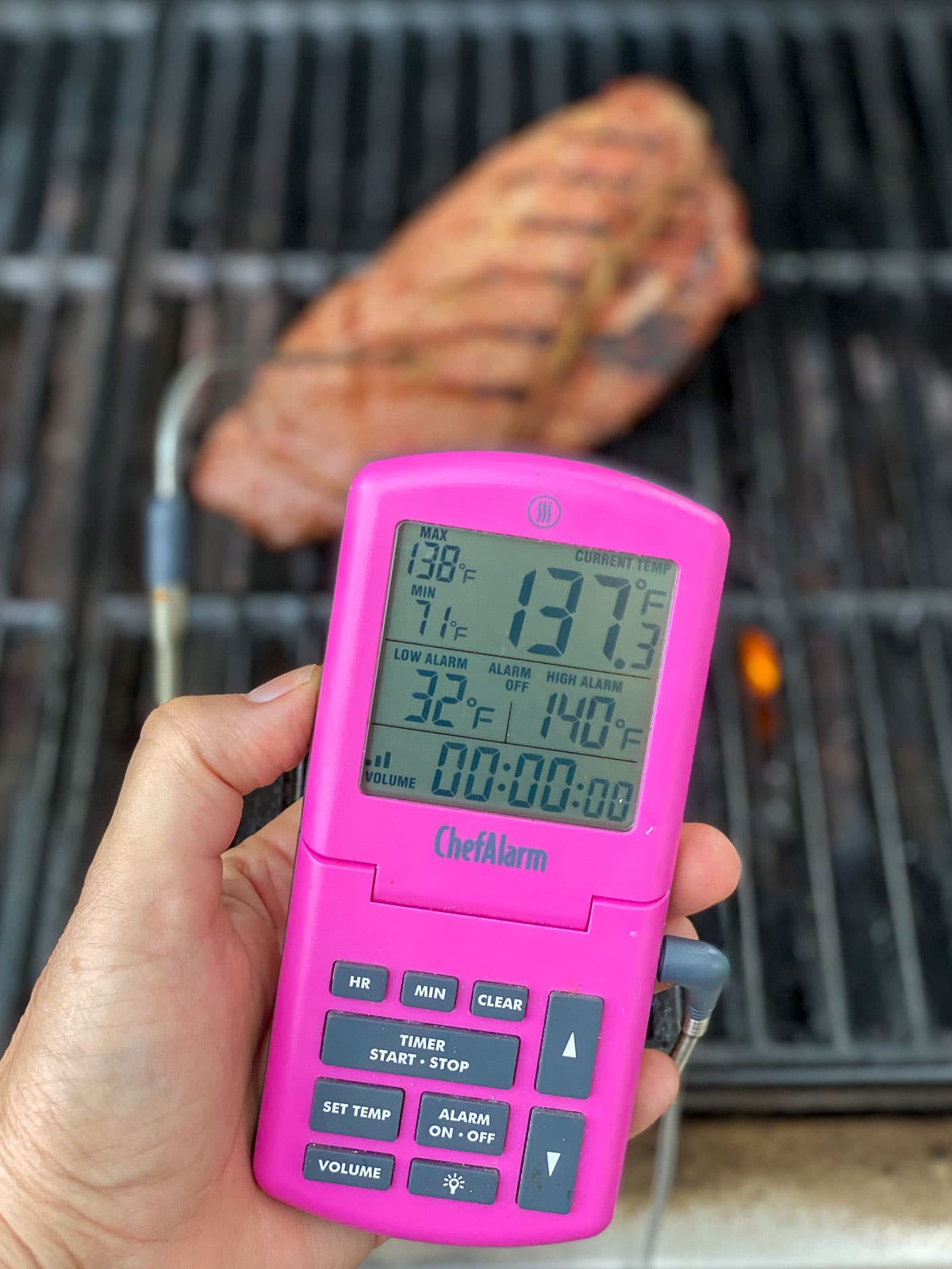 measuring internal temperature of grilled flank steak