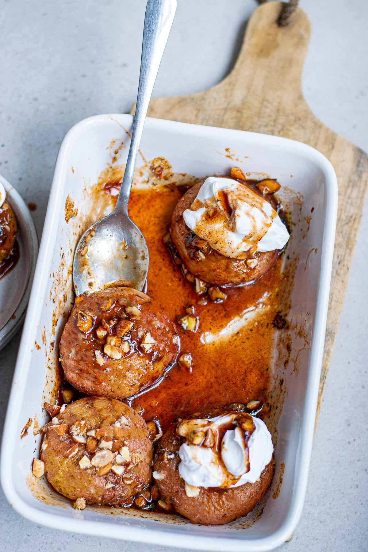 baked donut peaches with in baking dish 