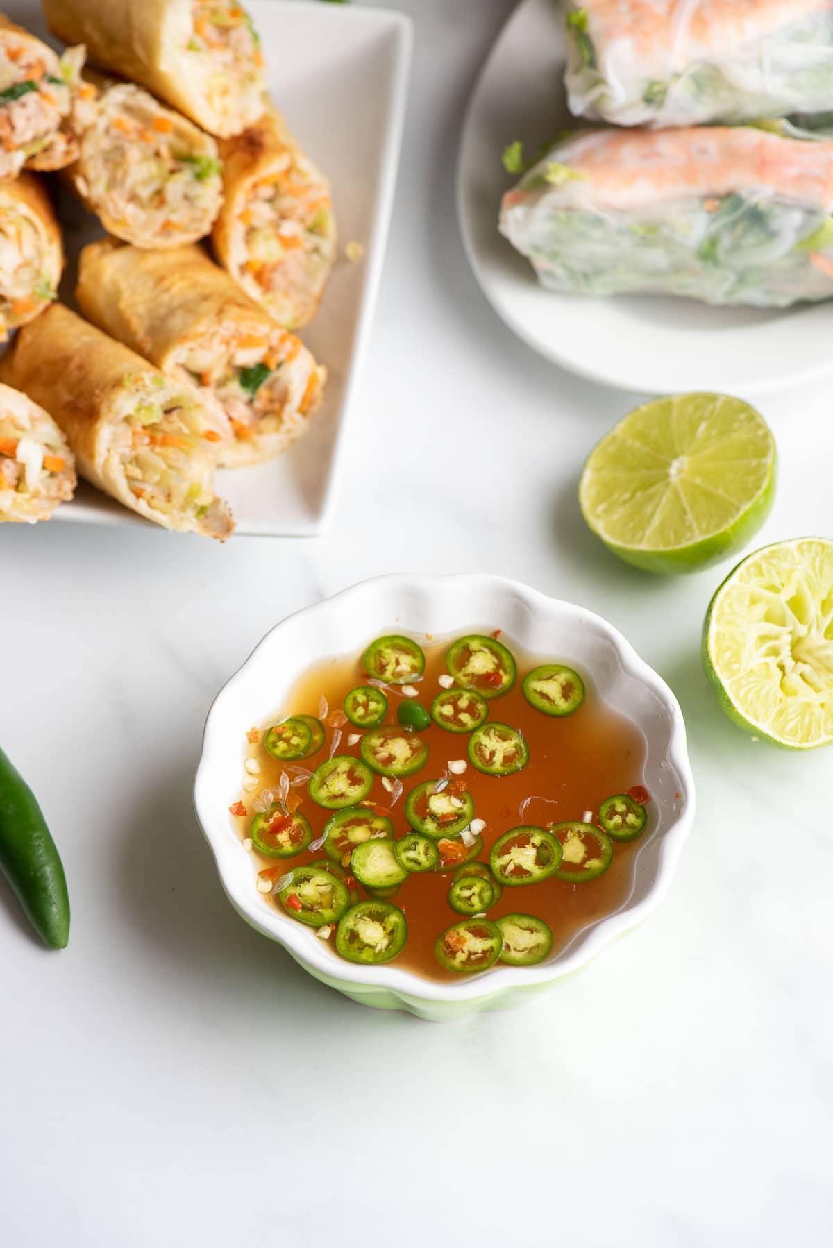 nuoc cham with egg rolls and spring rolls