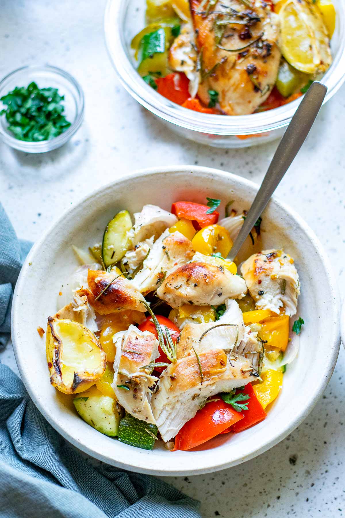 roasted chicken with vegetables cooked close in bowl
