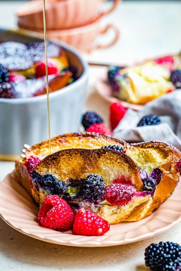 challah french toast with berries slice with syrup 