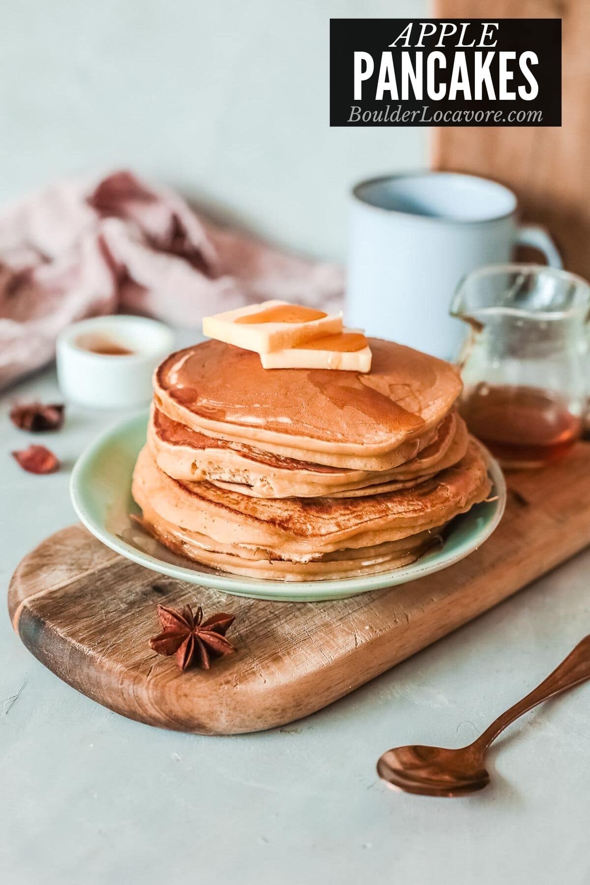 stack of apple pancakes with butter