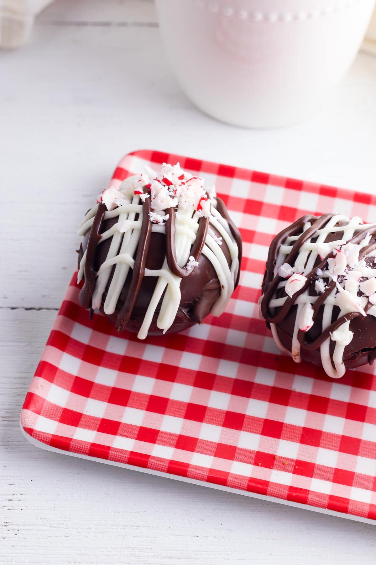 Peppermint Hot Chocolate Bombs on checked plate 