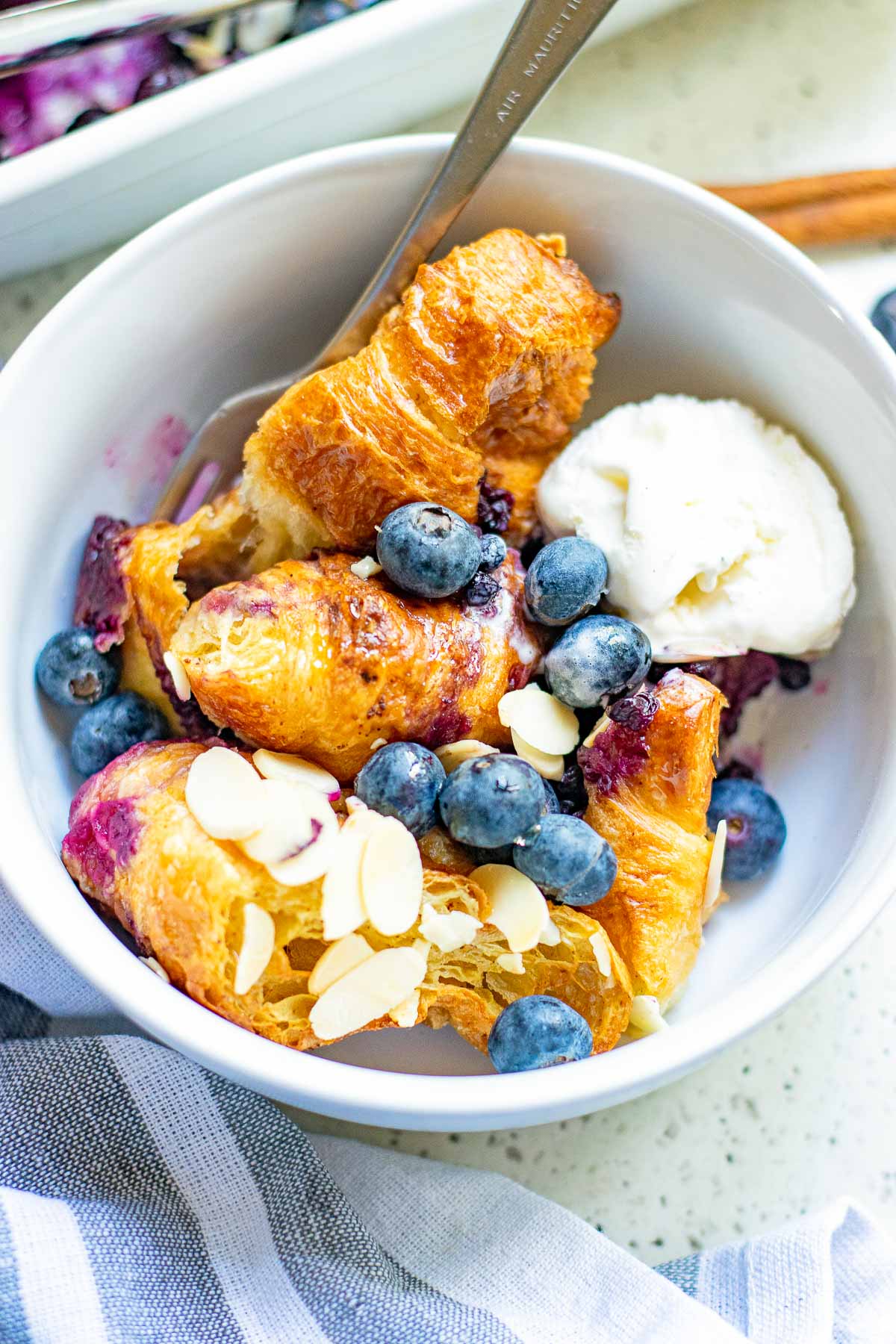 baked croissant french toast serving
