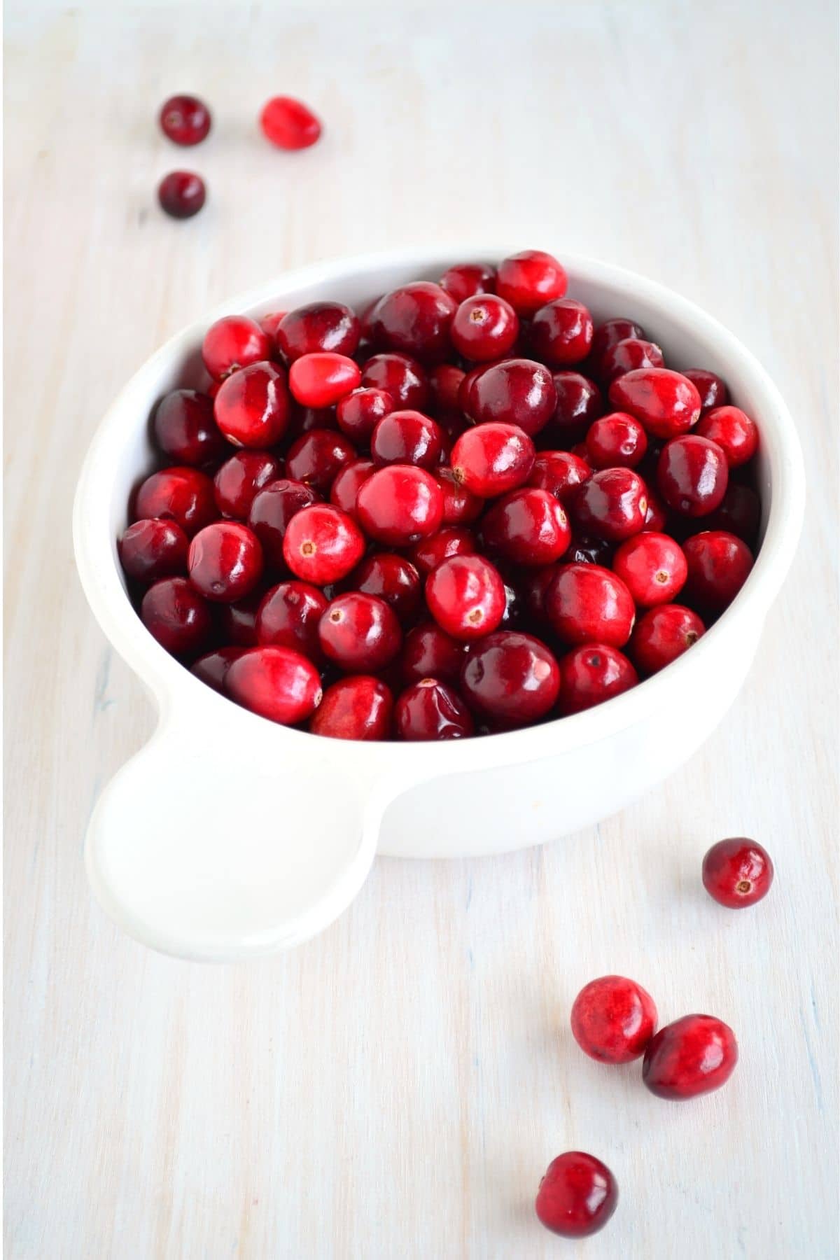 cranberries in a white bowl