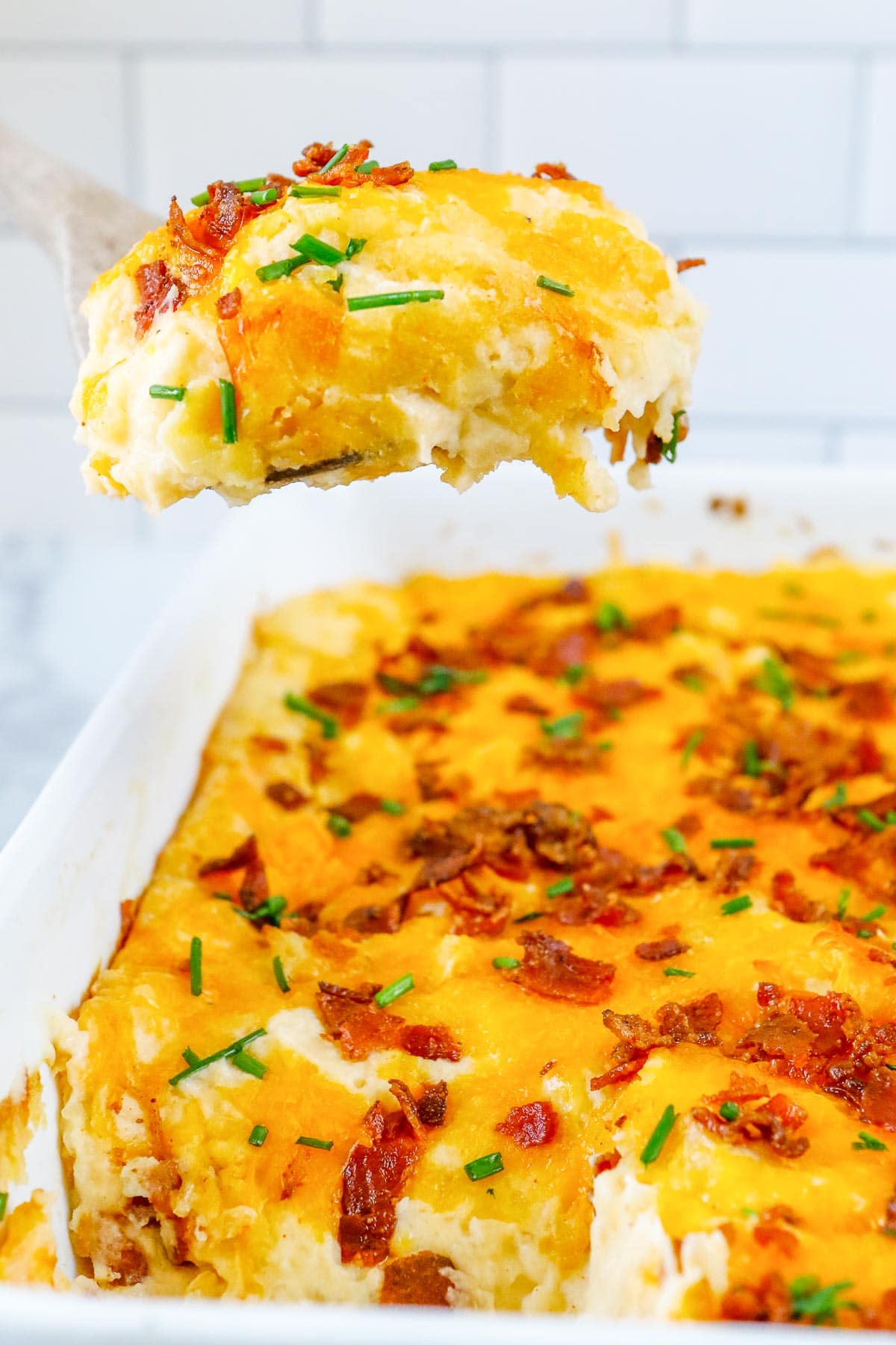 twice baked potato casserole spoonful side view 