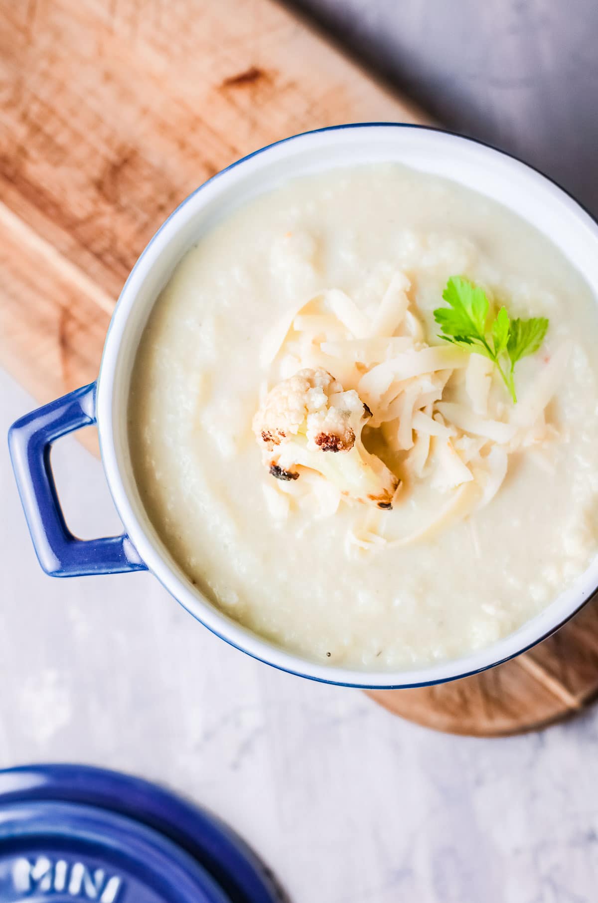 Cauliflower Cheese soup in bowl close up
