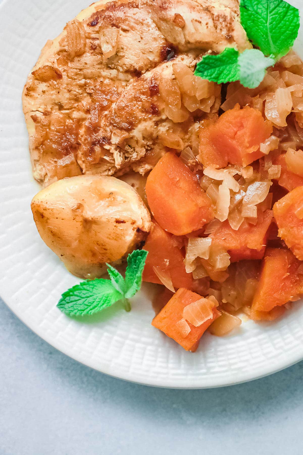 Moroccan Chicken with sweet potatoes close up