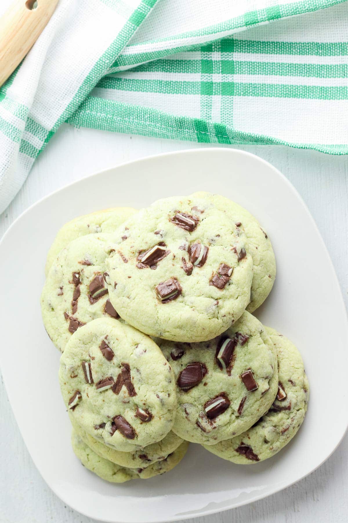 chocolate chip mint cookies on white plate 