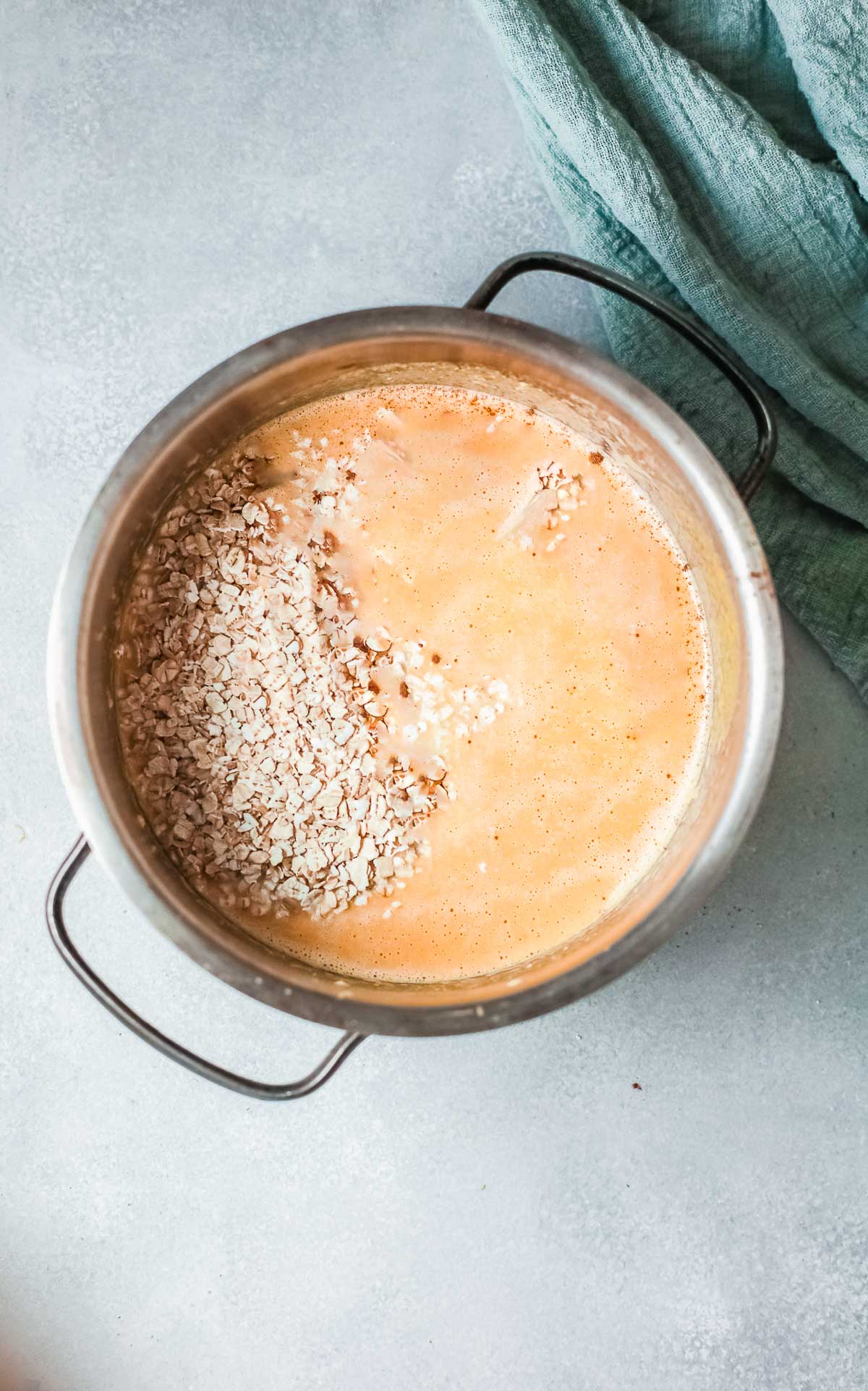 pumpkin oatmeal - adding the rolled oats