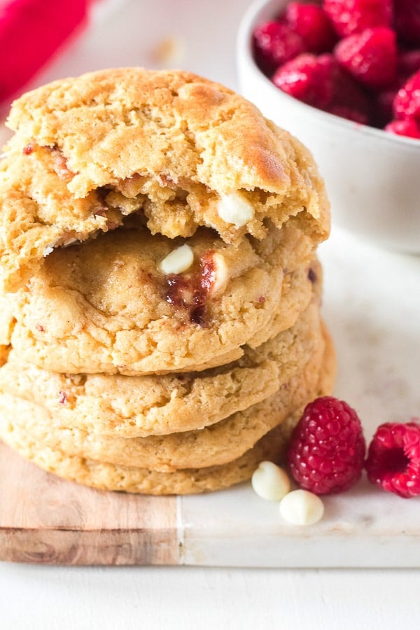 raspberry cheesecake cookies stacked bite