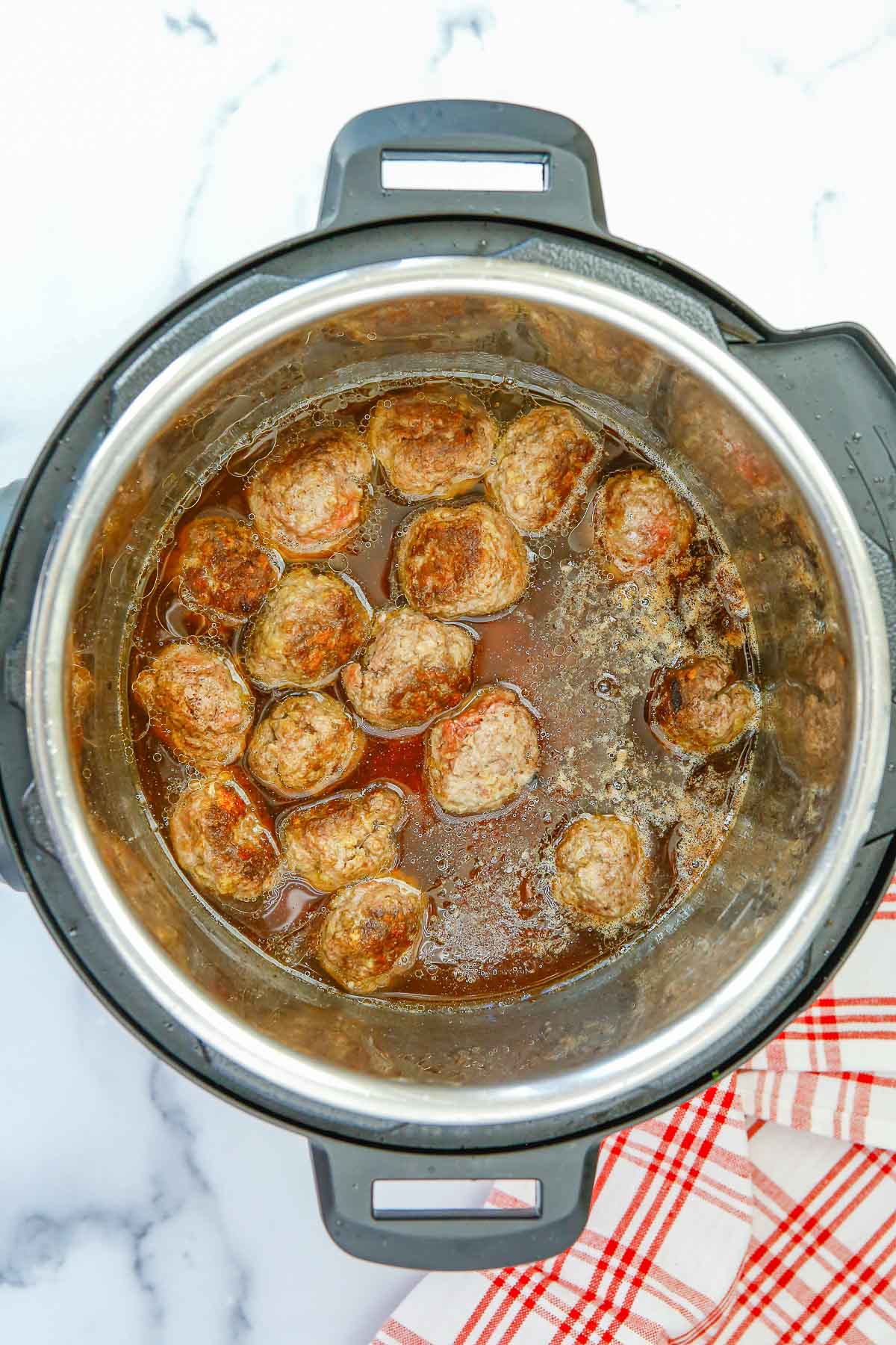 broth in Instant Pot with Swedish Meatballs