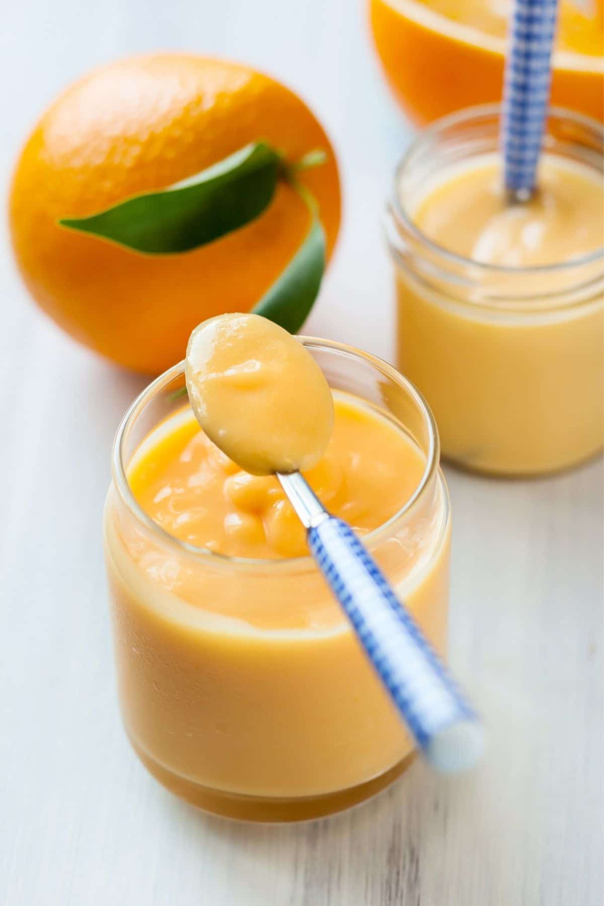 orange curd on a spoon