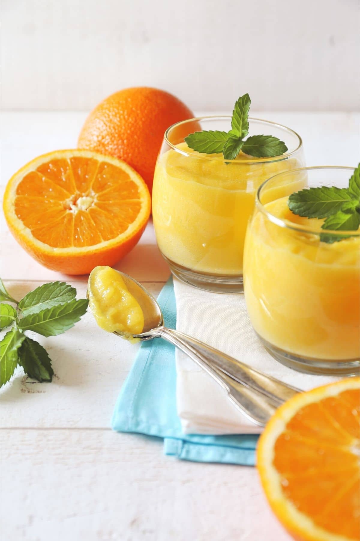 orange curd on spoons