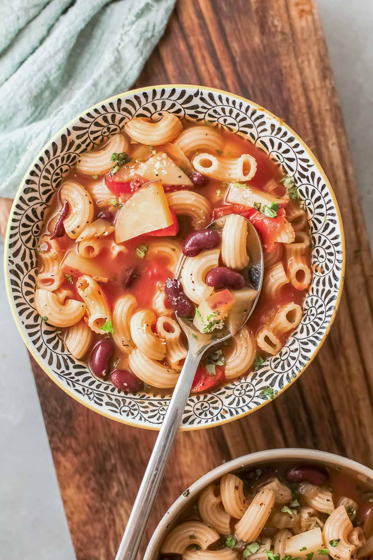 bowl of minestrone soup WITH SPOON