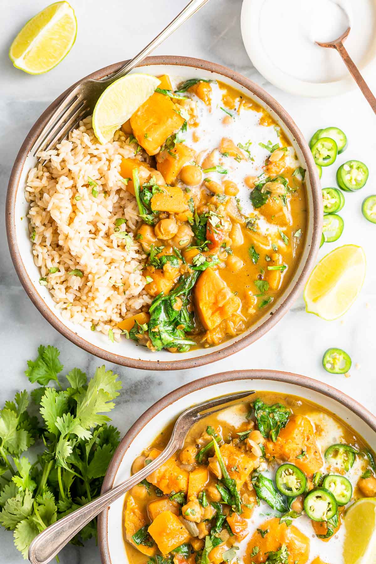 bowls of chickpea curry with rice 