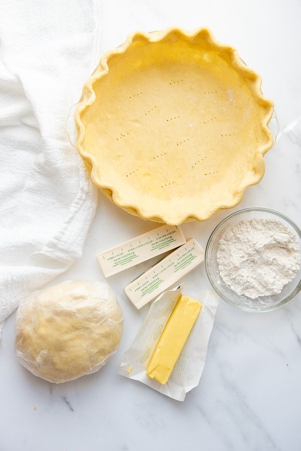 docked butter pie crust with ingredients 