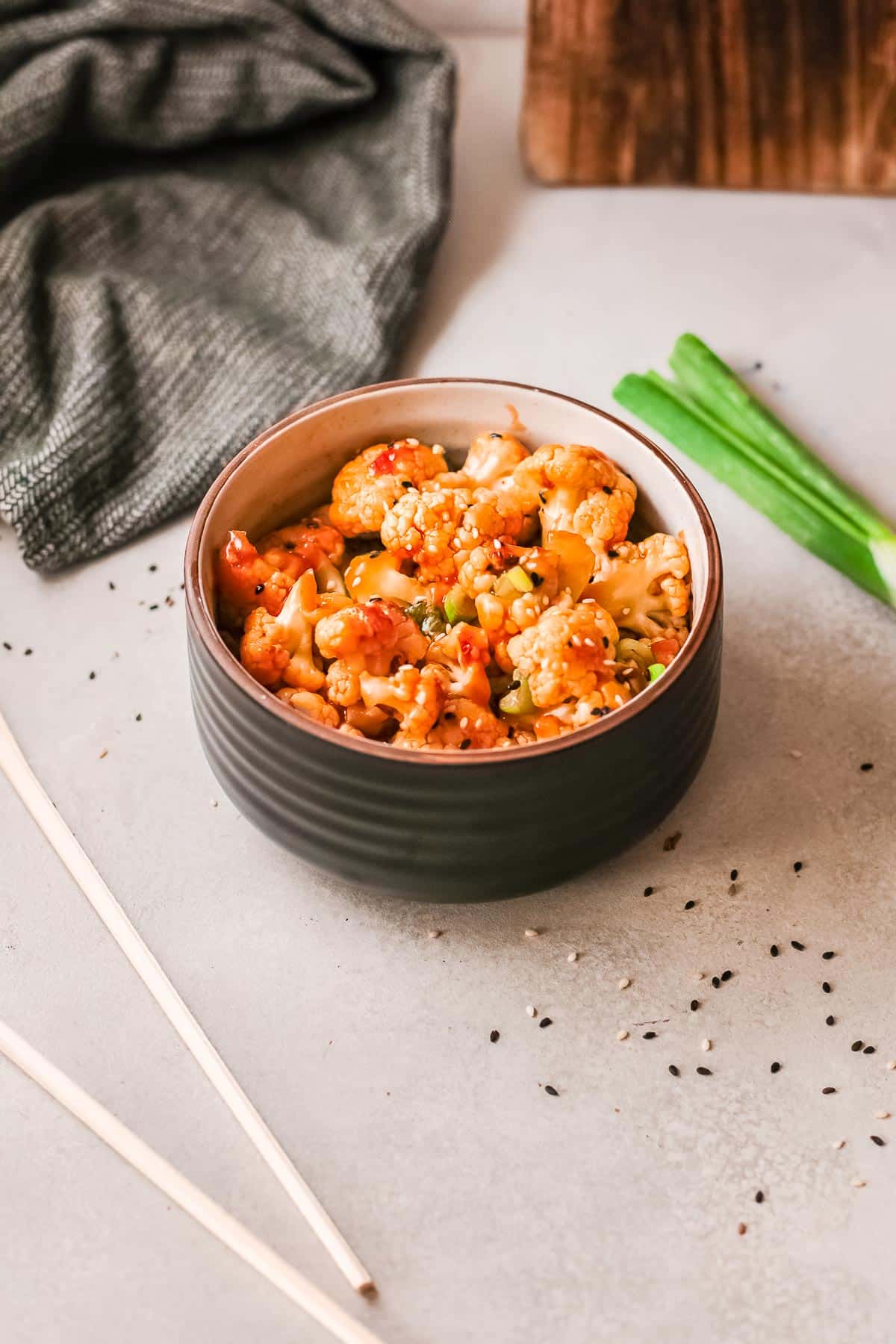 korean bbq cauliflower in bowl side 