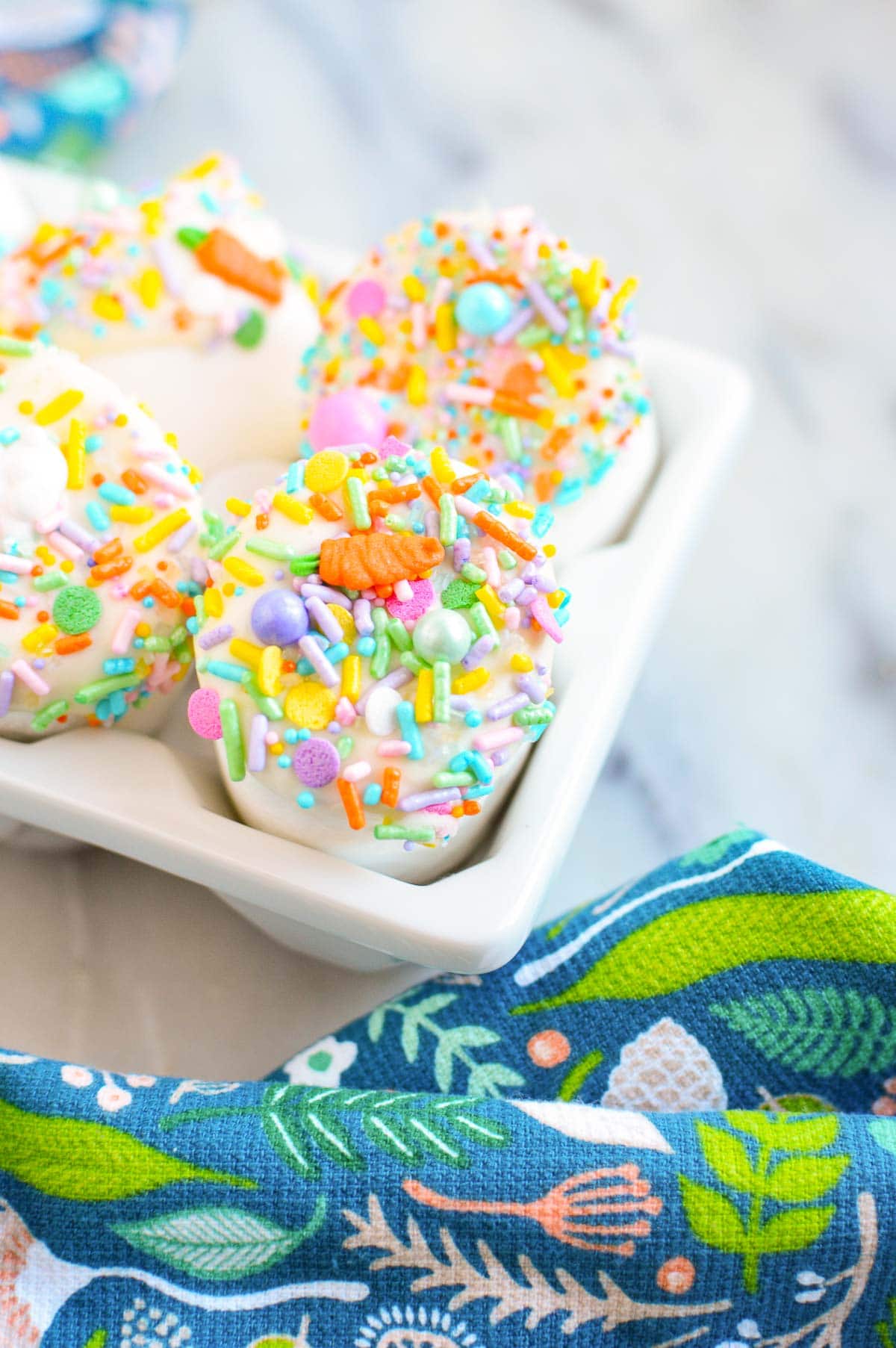 chocolate dipped marshmallows in container 