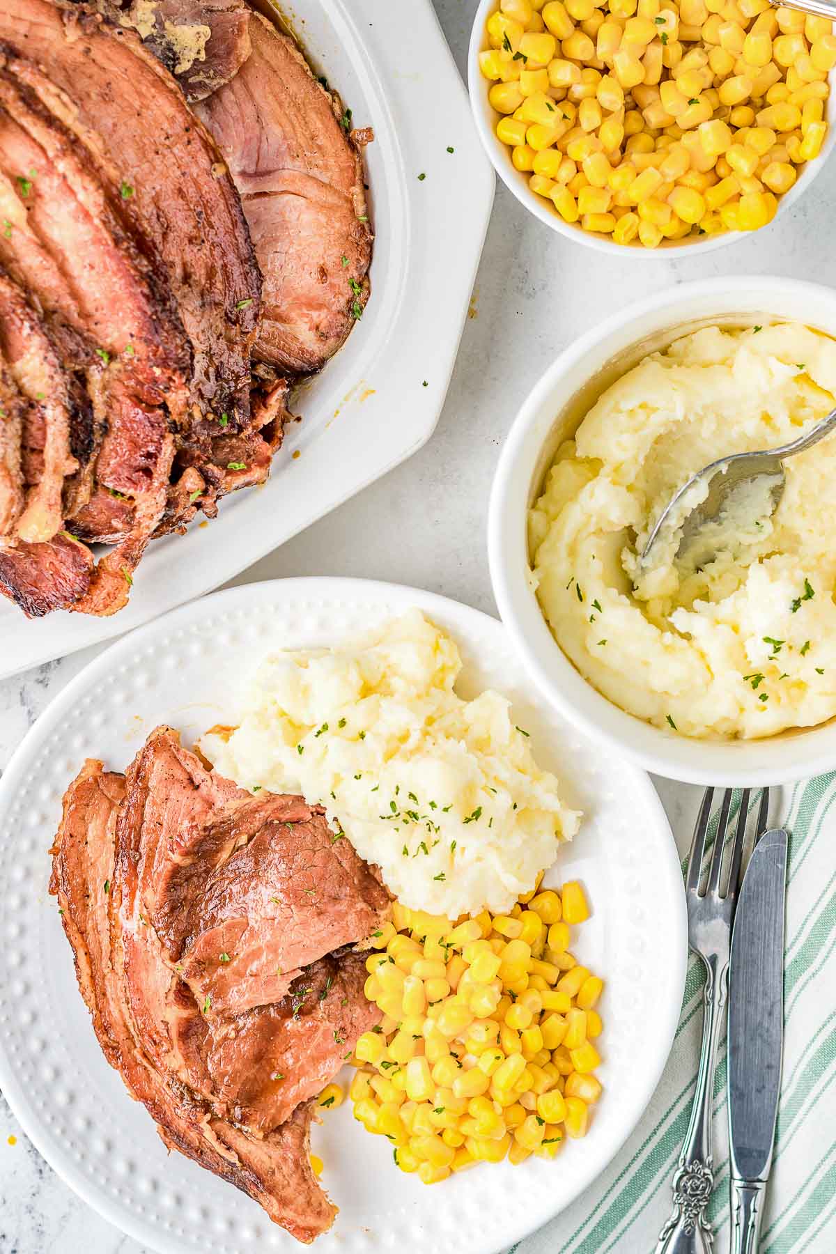 instant pot ham plated with sides