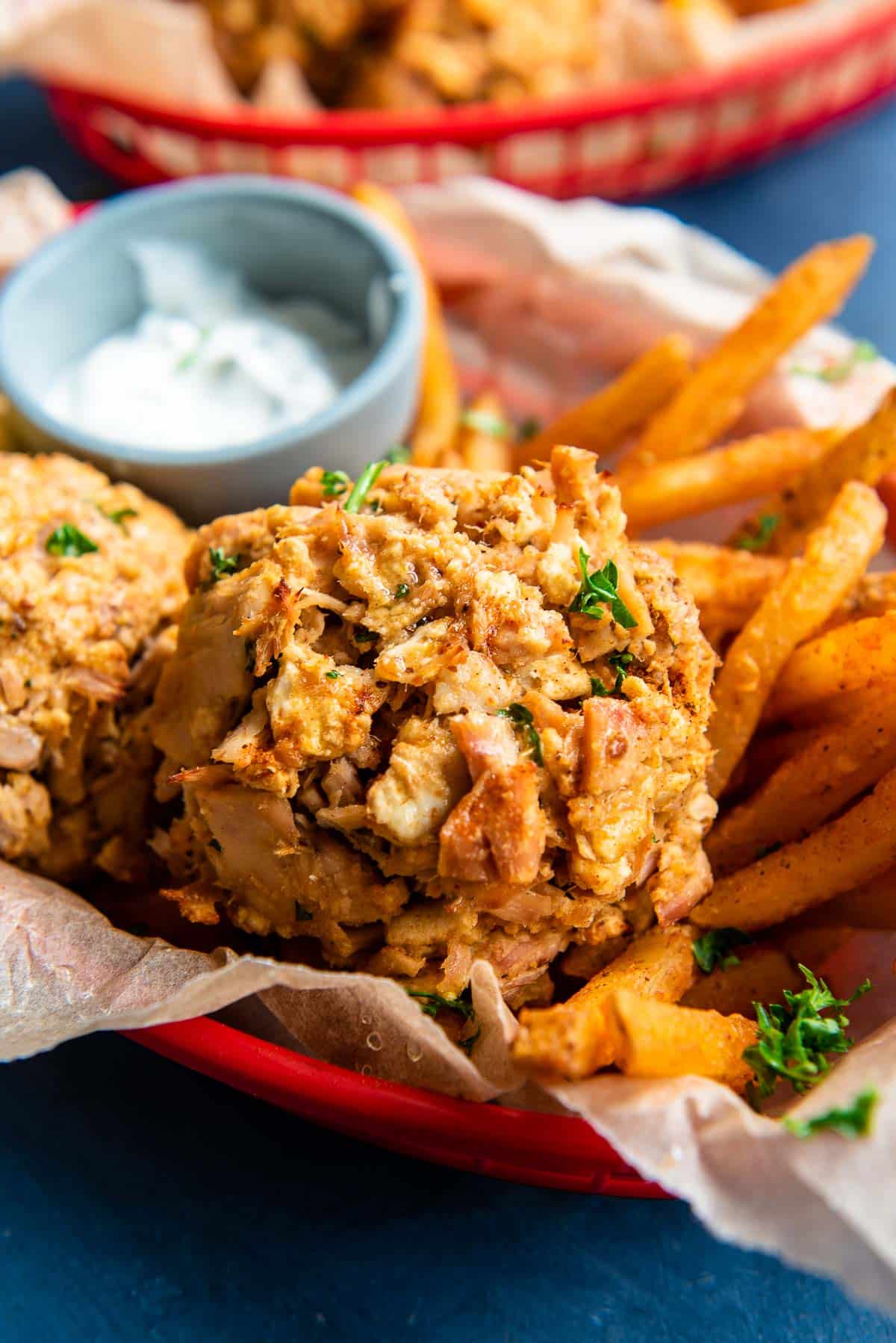 tuna cakes with fries close up 