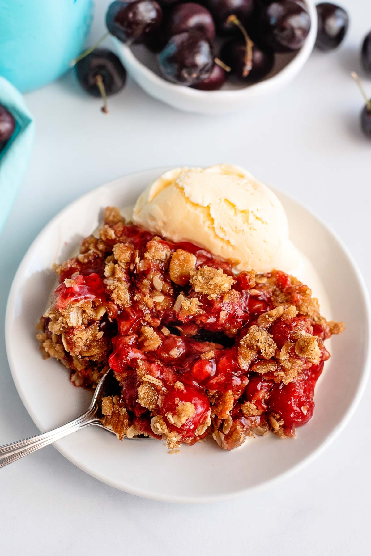 cherry crisp serving with ice cream